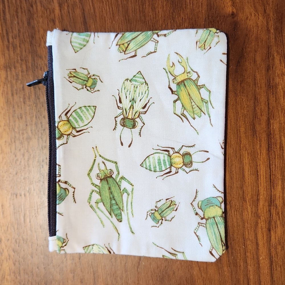 Unique coin purse 🪙 . Vibrant insects!🪲